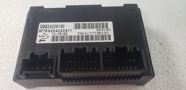 Programmed 2008-2013 Suburban 2500 TCCM, part 24242480. Shows the black plastic housing and electrical connectors for a plug-and-play 4WD system repair.
